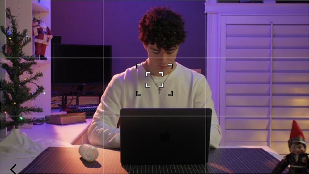Ryan filming himself at his desk